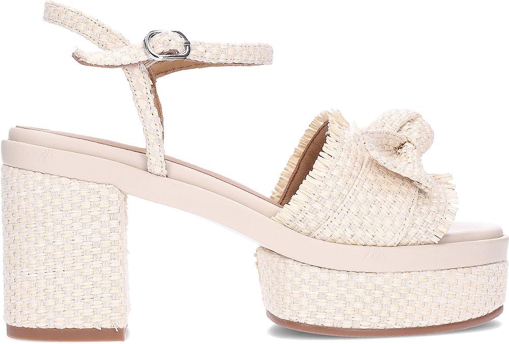 Pavo Monitor Arm installed on a wooden desk with cables organized